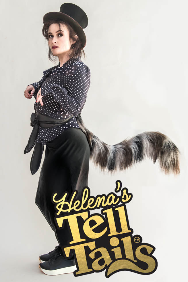 Helena Bonham Carter wears a fluffy tabby cat tail on a bow tie waistband in a feline pose. Perfect accessory for animal themed parties, Aristocats fans, kink parties, characters or cosplay, World Book Week, tabby mc Tat. Fancy dress accessory for skiing and snowboarding on the slopes. Hen and stag party novelty accessories, twerk, Glastonbury, waggle to jungle at Boomtown.
